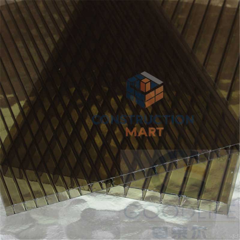  A 10mm bronze twin-wall polycarbonate sheet displayed on a table, highlighting its stylish appearance and durability for roofing projects
