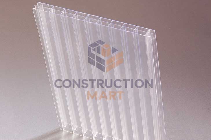 Transparent 8mm triple wall polycarbonate sheet photographed on the ground showing its light-transmitting structure