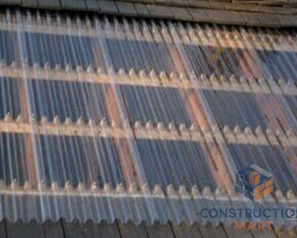 Partial view of a commercial retail center roof made with Constructionmart 840 polycarbonate corrugated sheets, enhancing daylight and modern aesthetics.