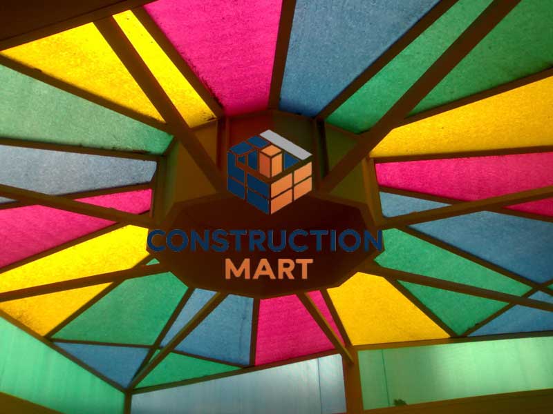 Multi-colored raindrop polycarbonate sheets from Constructionmart used as decorative privacy screens, offering both visual appeal and light diffusion.