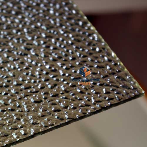 Grey raindrop-textured polycarbonate sheet by Constructionmart featured in a close-up hero image, clearly displaying its refined texture and modern appearance.