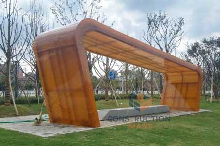 Outdoor architectural project using orange solid polycarbonate sheet with lighting effect, demonstrating creative canopy design