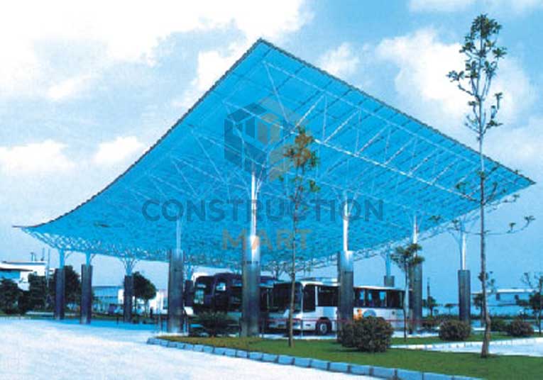 A large blue canopy made of twin-wall polycarbonate sheets, providing weather protection for cars and outdoor areas