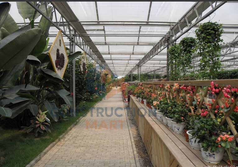 Inside view of a greenhouse built with twin-wall polycarbonate sheets, offering excellent light diffusion and thermal insulation for plants