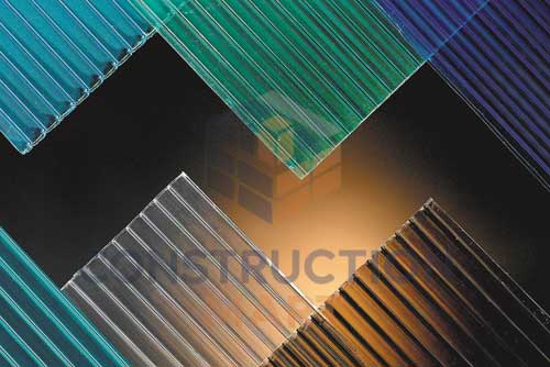 A group of colorful twin-wall polycarbonate sheets, displaying Constructionmart’s multi-color options for architectural and roofing projects