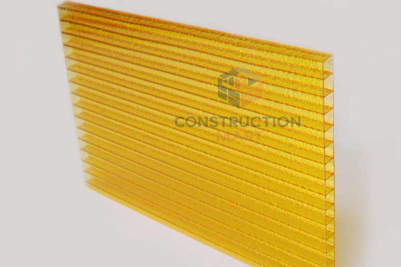 A bright yellow hollow polycarbonate sheet with a glossy surface, highlighting its vivid color and light transmission effect